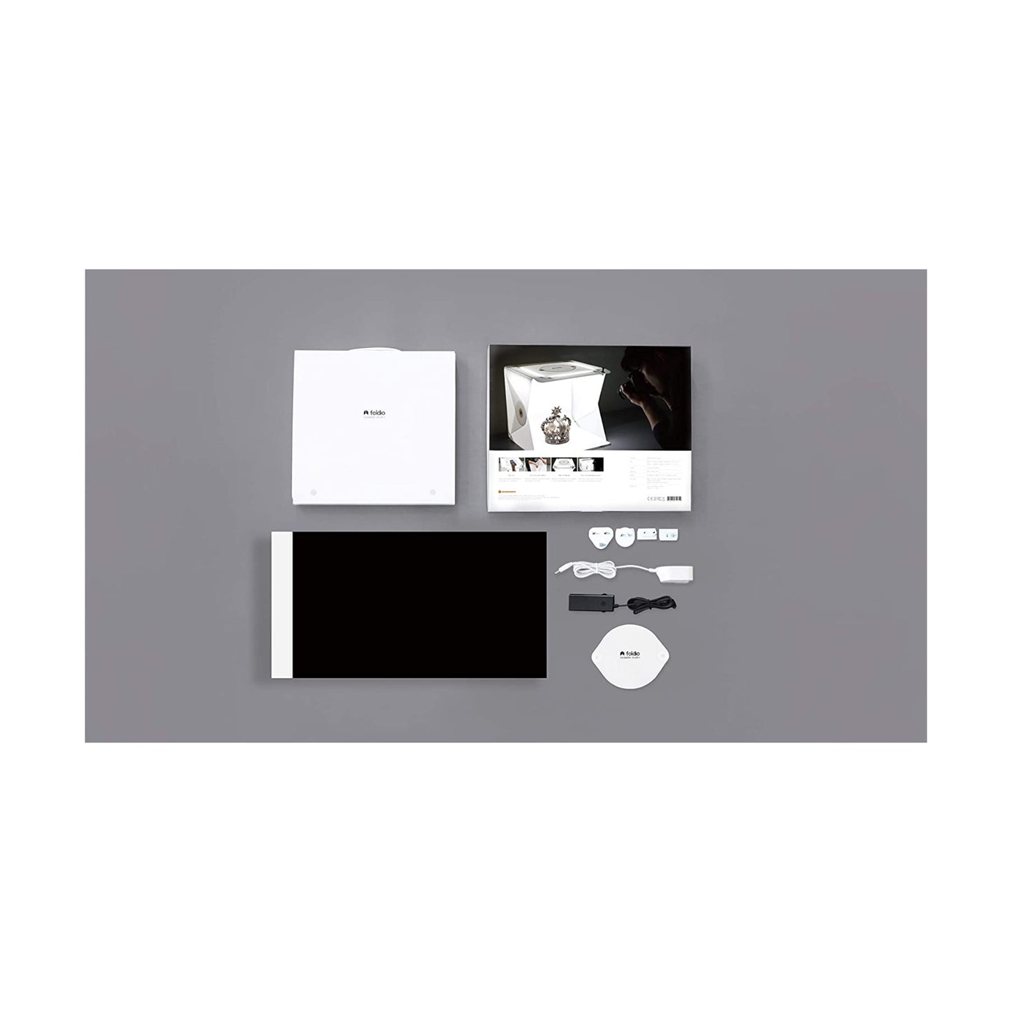 احصل على استديو ORANGEMONKIE Foldio2 Plus من اكس ستور في قطر. إضاءة LED ثلاثية، قابل للطي، مثالي لتصوير احترافي للمنتجات.