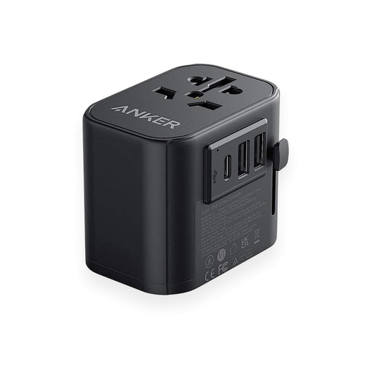 All-in-one compact travel adapter with multi-regional plugs for over 160 countries from xStore in Qatar.