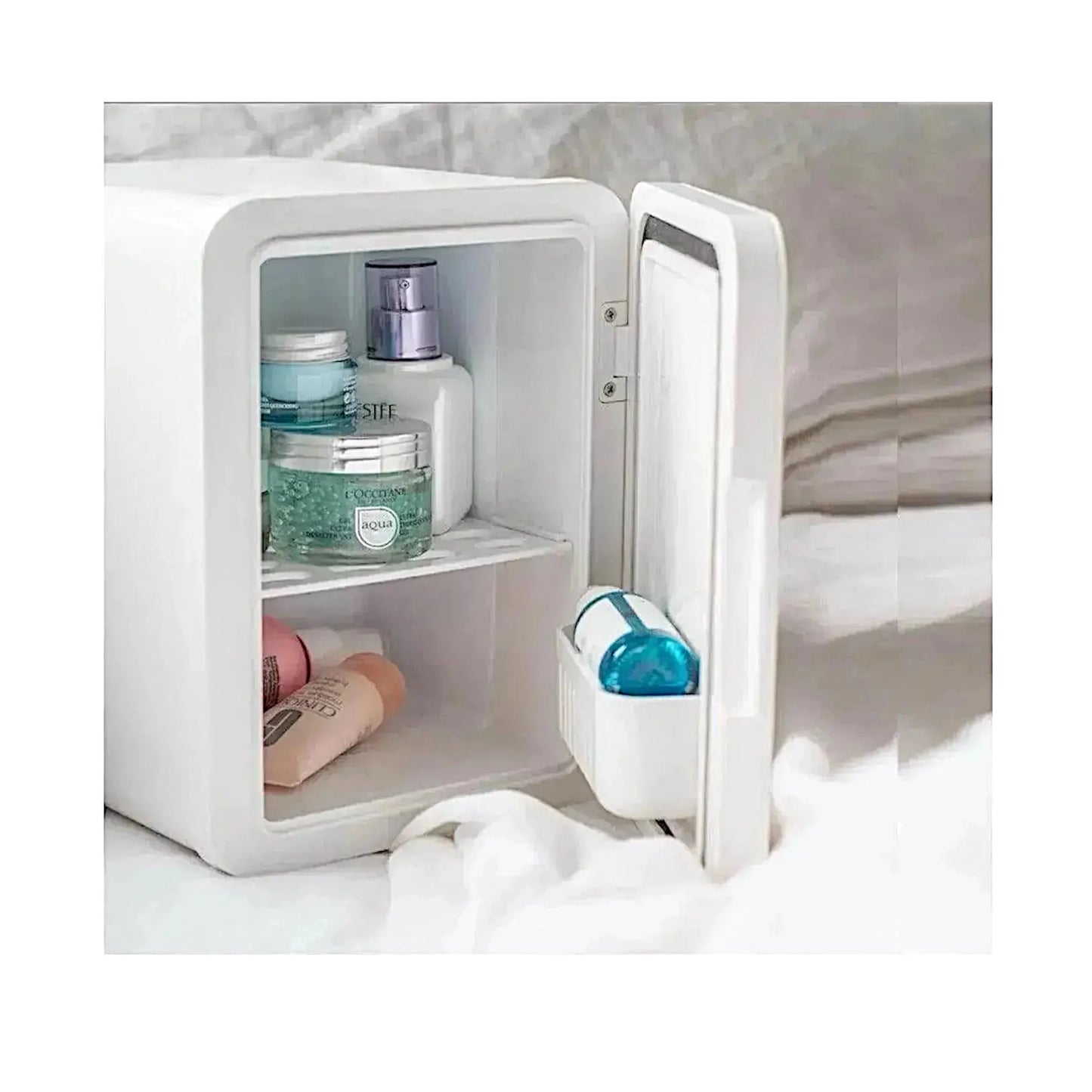 ‫احصل على ثلاجة محمولة صغيرة سعة ٨ لتر من اكس ستور في قطر. تبريد وتسخين، تصميم صغير وخفيف يناسب السفر، المكتب، الغرف. 