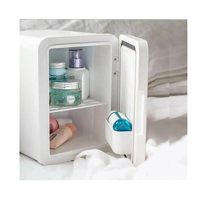 ‫احصل على ثلاجة محمولة صغيرة سعة ٨ لتر من اكس ستور في قطر. تبريد وتسخين، تصميم صغير وخفيف يناسب السفر، المكتب، الغرف. 